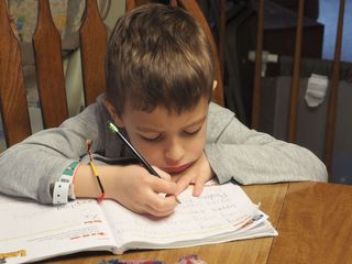 boy doing handwriting